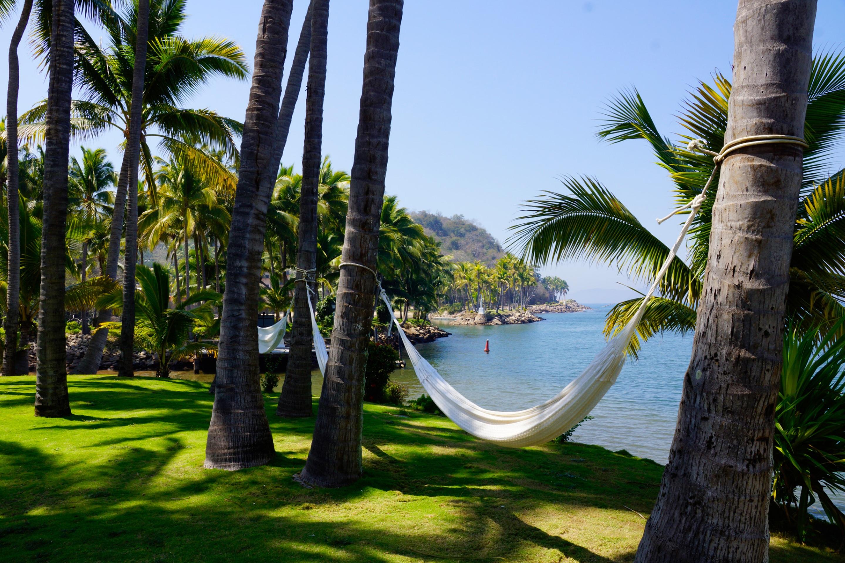 Grand Isla Navidad Golf & Spa Resort With Marina Барра-де-Навідад Екстер'єр фото Hammock on a tropical beach